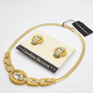 Demi parure firmata Carolina Herrera, ancora con le etichette e confezioni originali anni '80, collana e orecchini a clip, metallo color oro con cristalli diamante - VINTAGE AMORE MIO