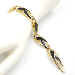 Bracciale Trifari anni '70 realizzato in lega Trifanium color oro con smalto nero - VINTAGE AMORE MIO