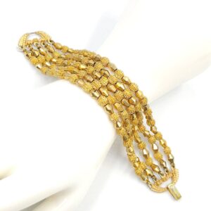 Parure Trifari della serie Electra realizzata nella seconda metà degli anni '50, composta da collana e bracciale, entrambi a cinque fili di pepite di lega Trifanium color oro - VINTAGE AMORE MIO