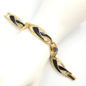 Bracciale Trifari anni '70 realizzato in lega Trifanium color oro con smalto nero - VINTAGE AMORE MIO