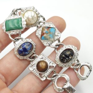 Bracciale anni '60 firmato Sarah Coventry, realizzato in metallo color argento con cabochons marmorizzati di vari colori e forme - VINTAGE AMORE MIO