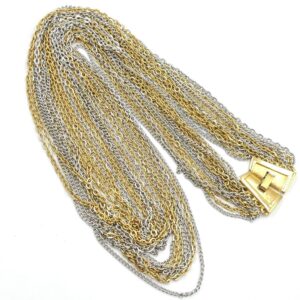 Collana multicatena firmata Trifari risalente al 1960 circa, composta da catene di lega Trifanium color oro e argento, chiusura in lega Trifanium color oro satinato - VINTAGE AMORE MIO