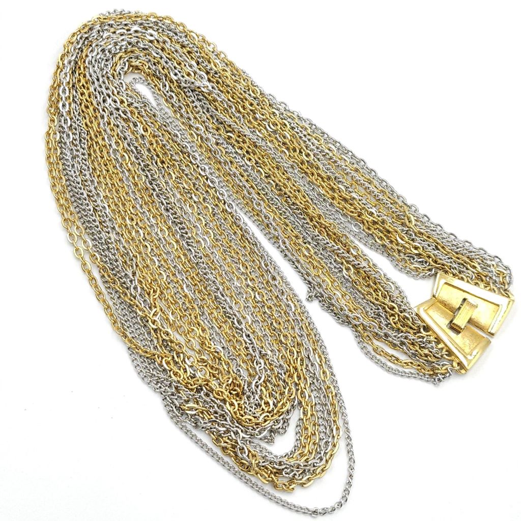 Collana multicatena firmata Trifari risalente al 1960 circa, composta da catene di lega Trifanium color oro e argento, chiusura in lega Trifanium color oro satinato - VINTAGE AMORE MIO