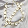 Parure Trifari anni ’50 lega Trifanium oro e lucite bianca
