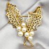 Grande spilla botanica Trifari oro e perle