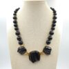 Collana Trifari lega Trifanium color oro con lucite nera