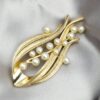 Grande spilla Trifari oro e perle anni ’50